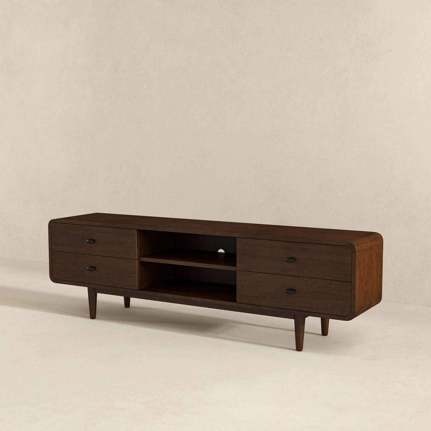 Dark wood midcentury modern media console with four drawers and open shelving
