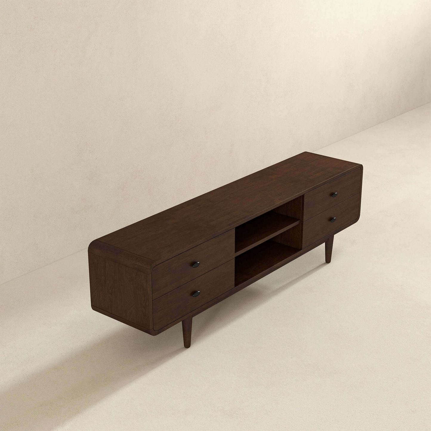 Dark wood midcentury modern media console with tapered legs and black knobs