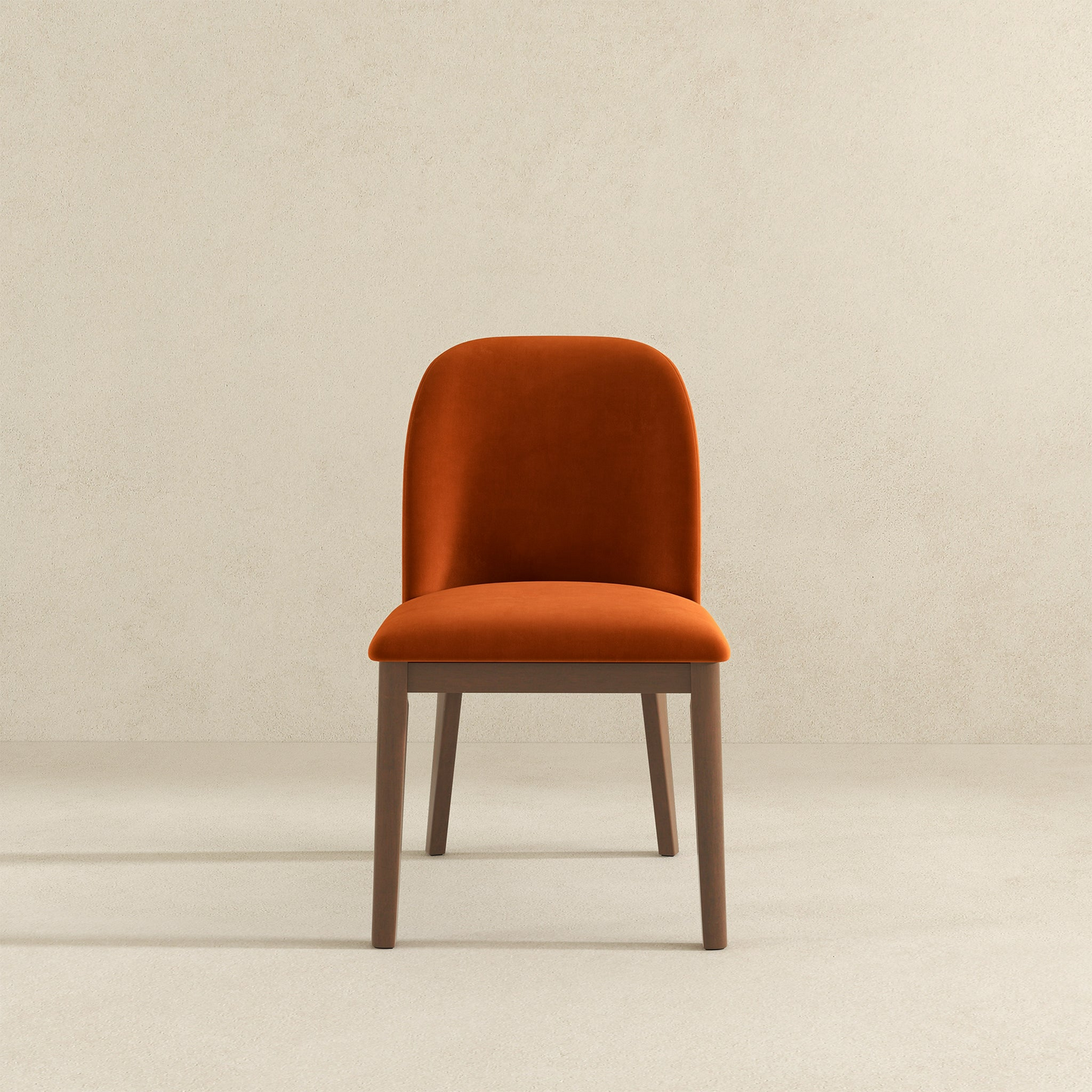 Orange velvet dining chair with walnut wood legs modern accent piece for any home