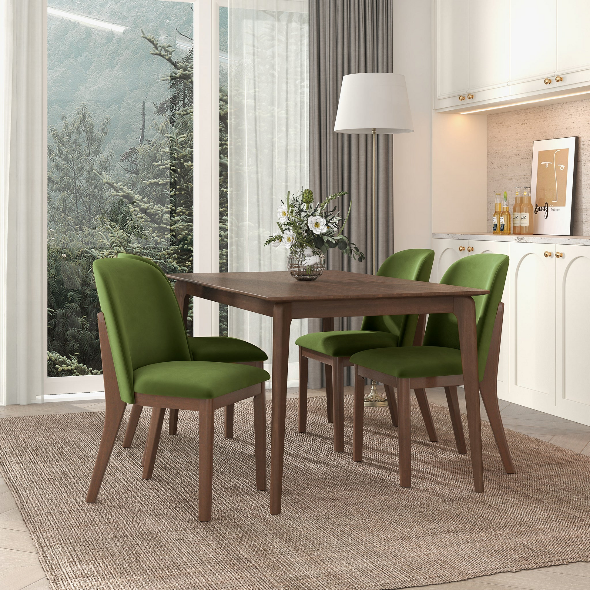 Midcentury modern dining chairs in emerald green velvet upholstery with dark wood legs