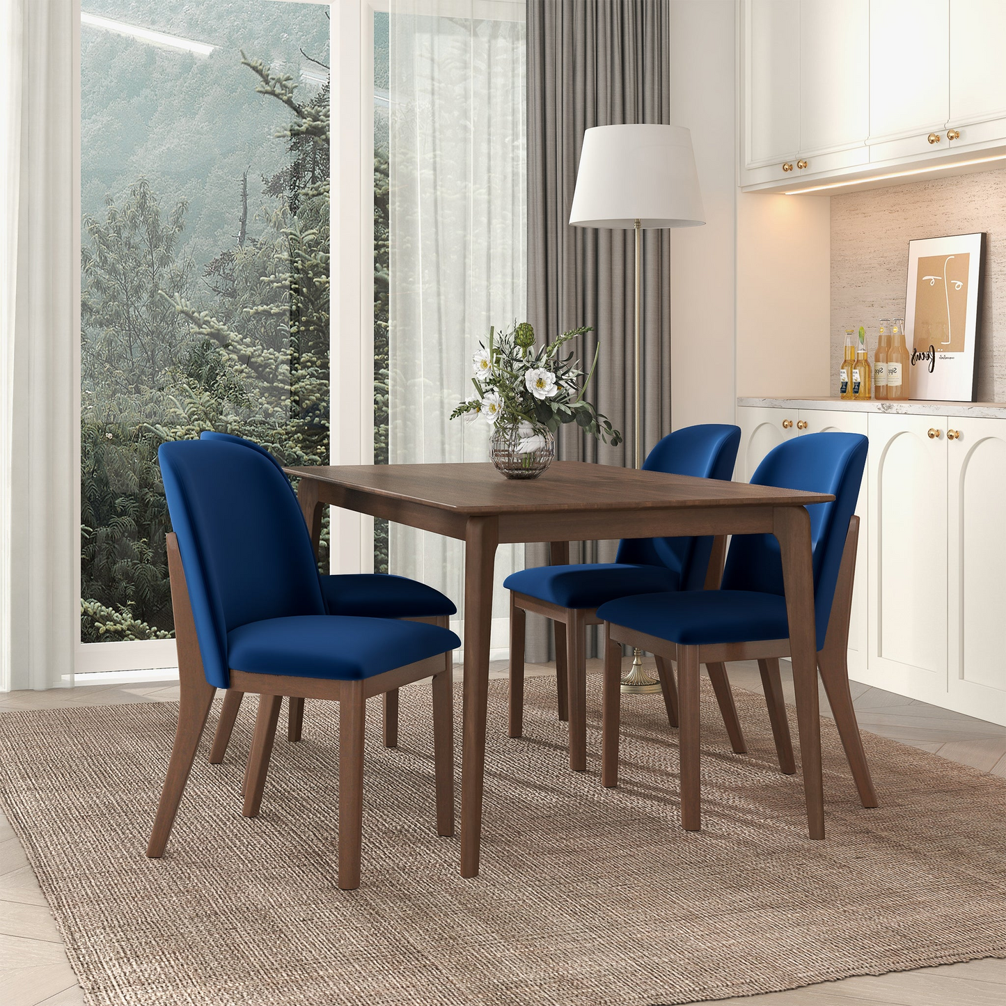 Dark blue velvet dining chairs with wooden frames around a dark wood table