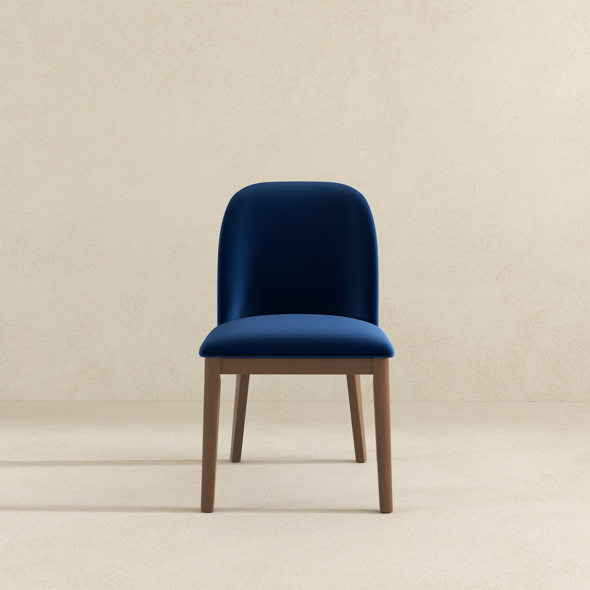 Navy blue velvet dining chair with natural wood legs