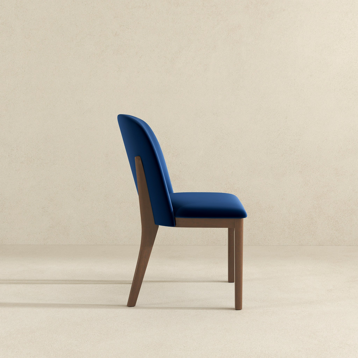 Deep blue velvet dining chair with wooden legs modern accent piece