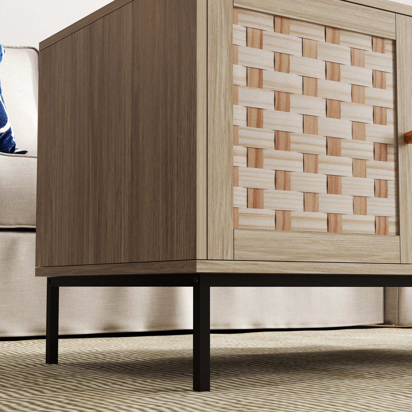 Light oak cabinet with woven wood door panel and black metal legs