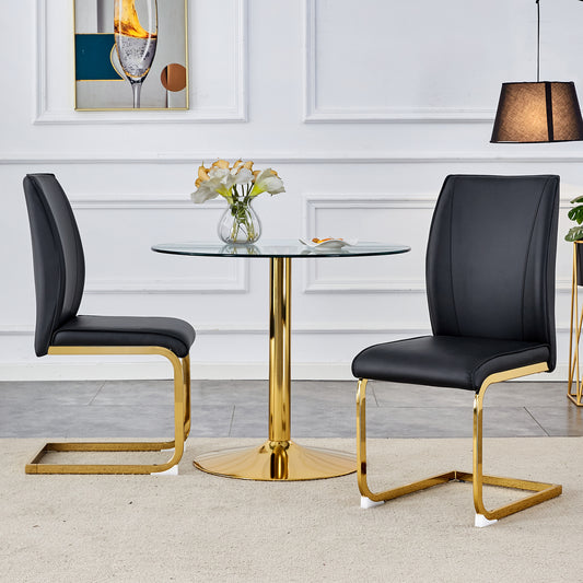 Modern black faux leather dining chair with polished gold cantilever base