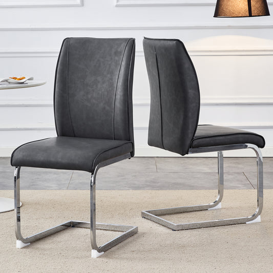 Dark gray faux leather dining chair with chrome cantilever base