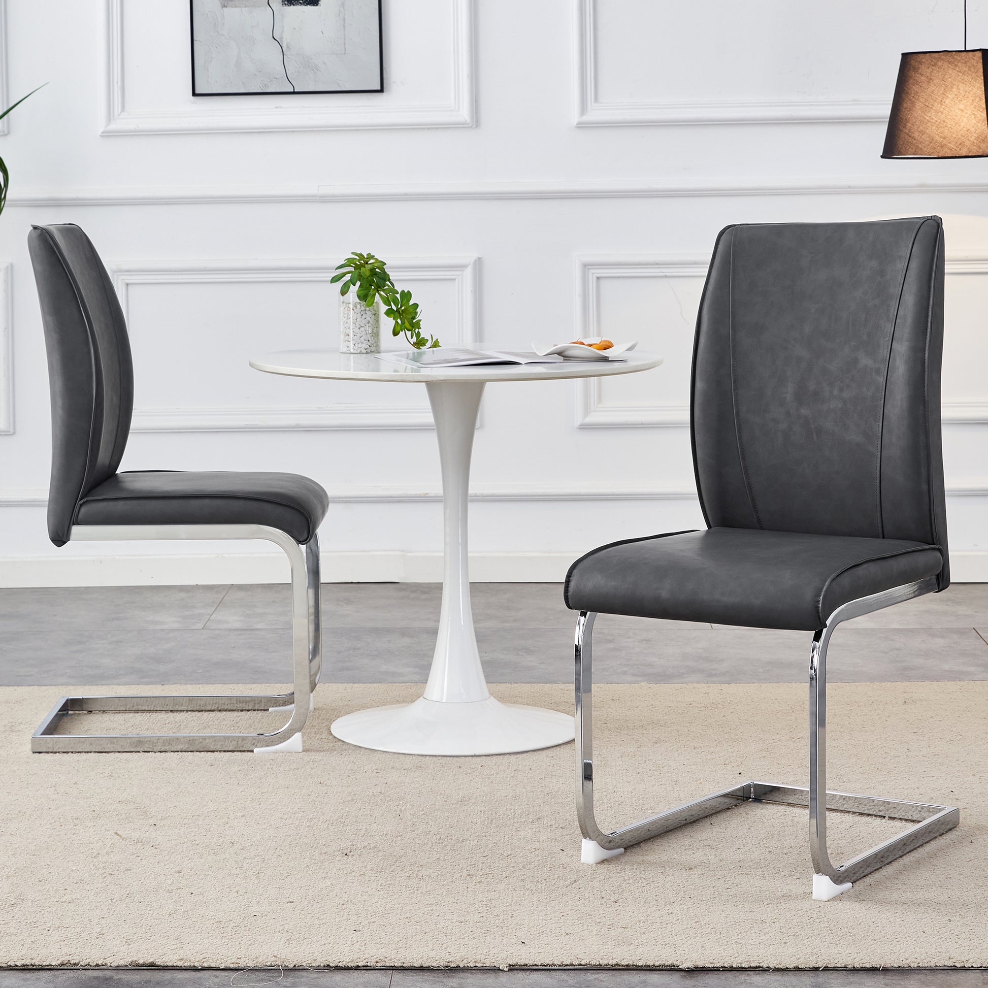 Dark grey faux leather dining chair with chrome cantilever base set of two