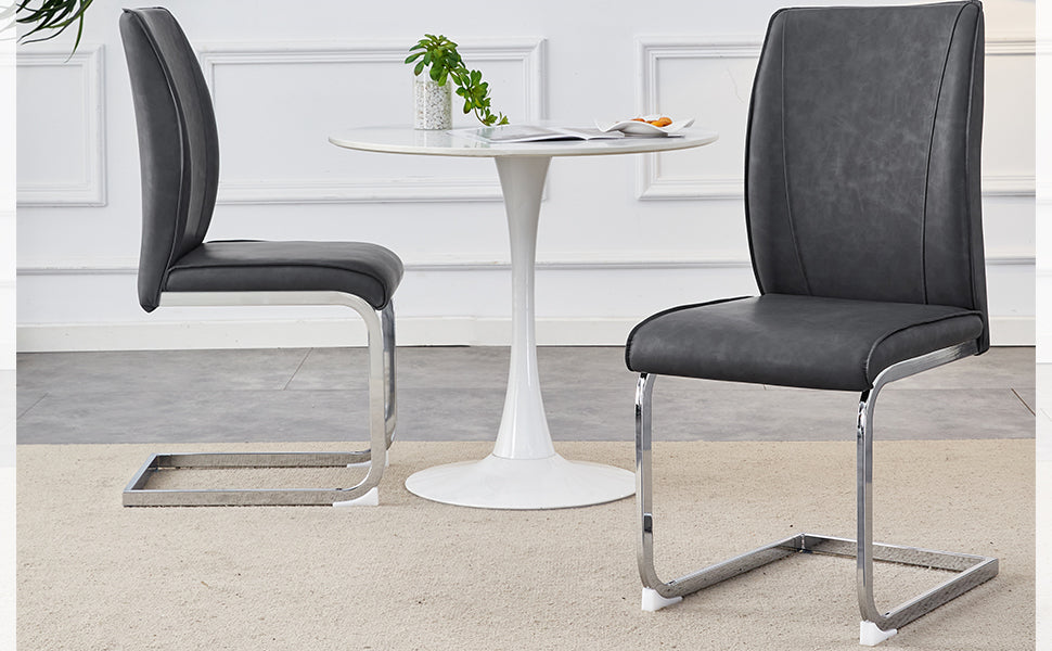 Modern grey faux leather dining chair with chrome cantilever base