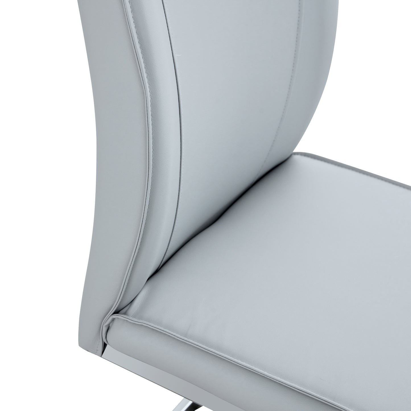 Closeup of a sleek light gray vegan leather chair seat with channel stitching detail