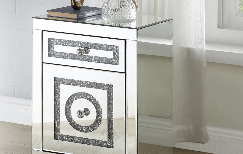 Mirrored accent table with crystal drawer knobs and a crystal inlay design