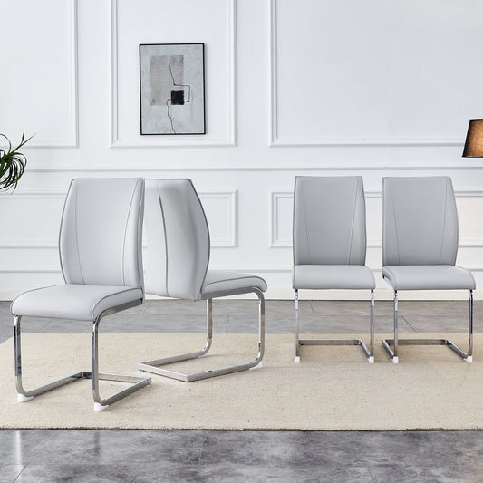 Set of  modern grey faux leather dining chairs with chrome cantilever bases