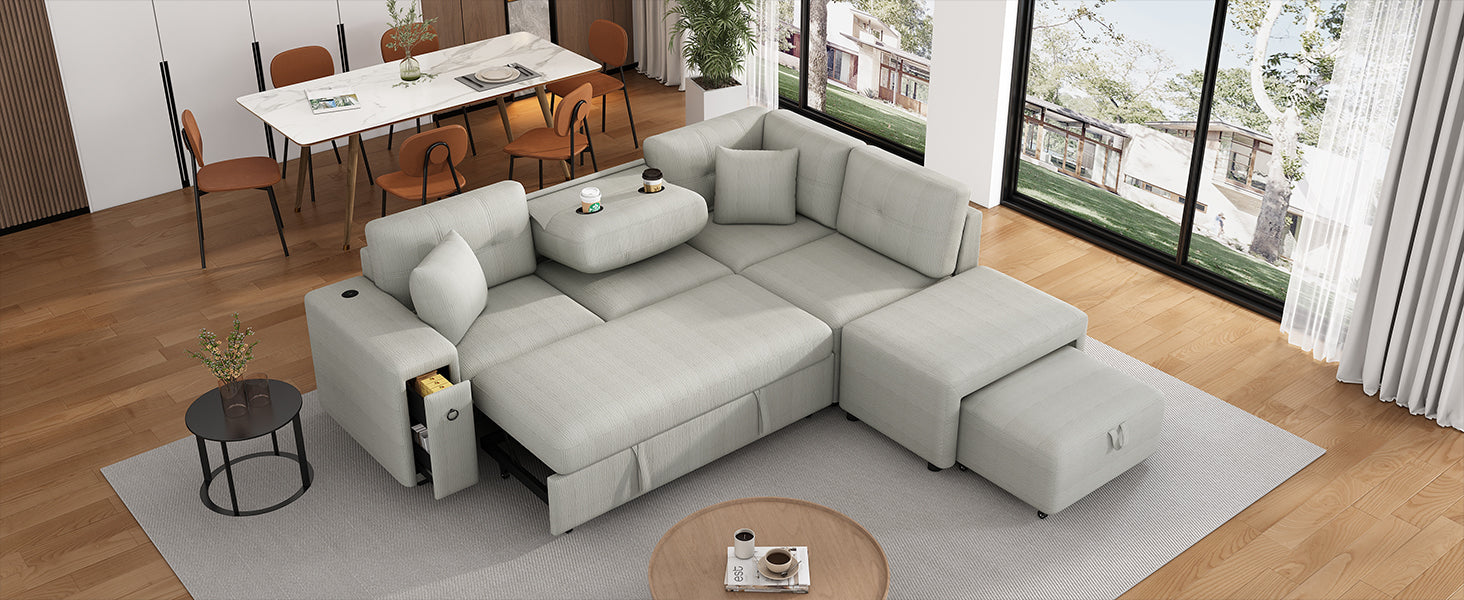 Light grey sectional sofa with pullout bed storage and cup holders