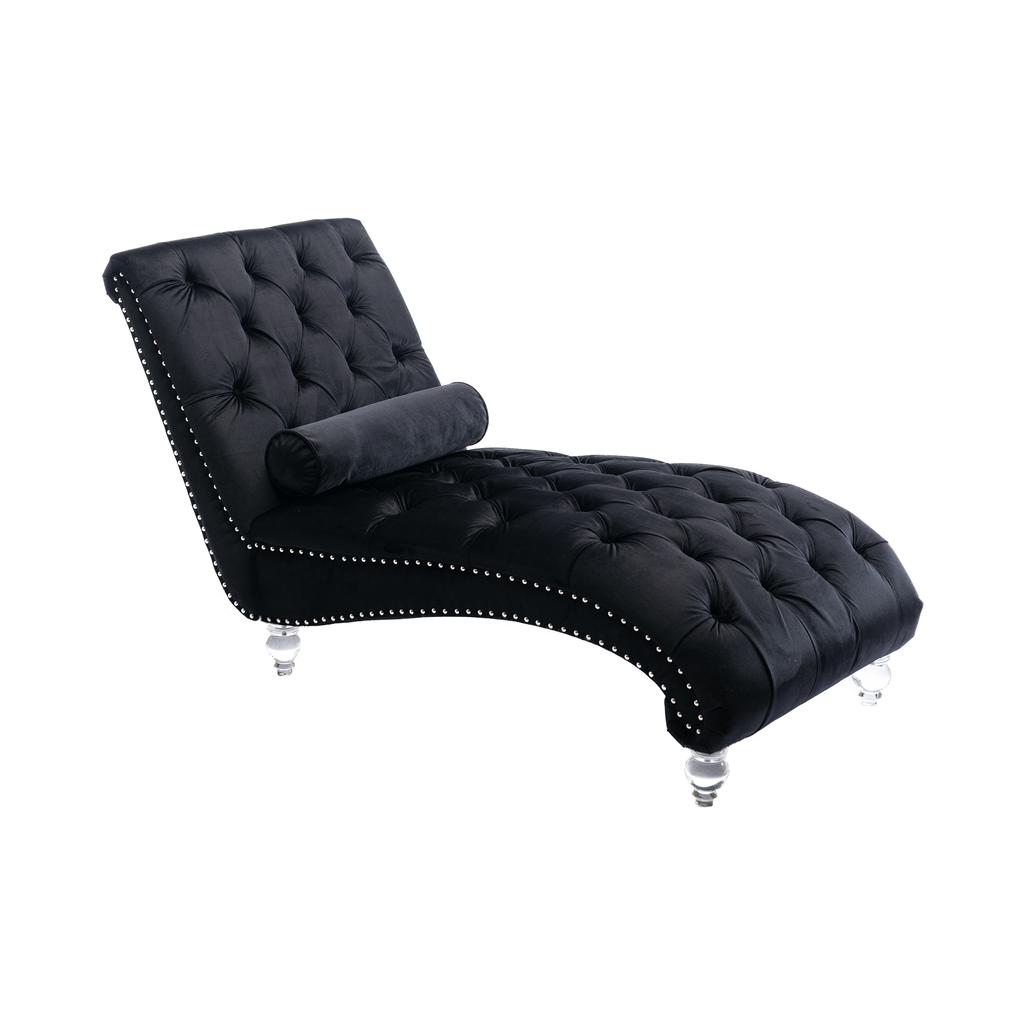 Black velvet tufted chaise lounge with silver nailhead trim and acrylic legs