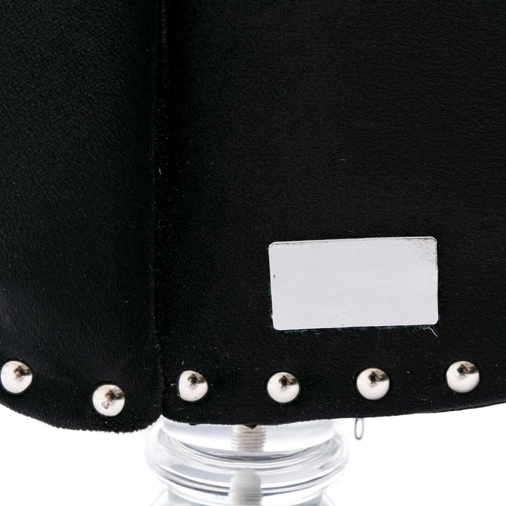 Black velvet studded purse strap detail on clear acrylic base