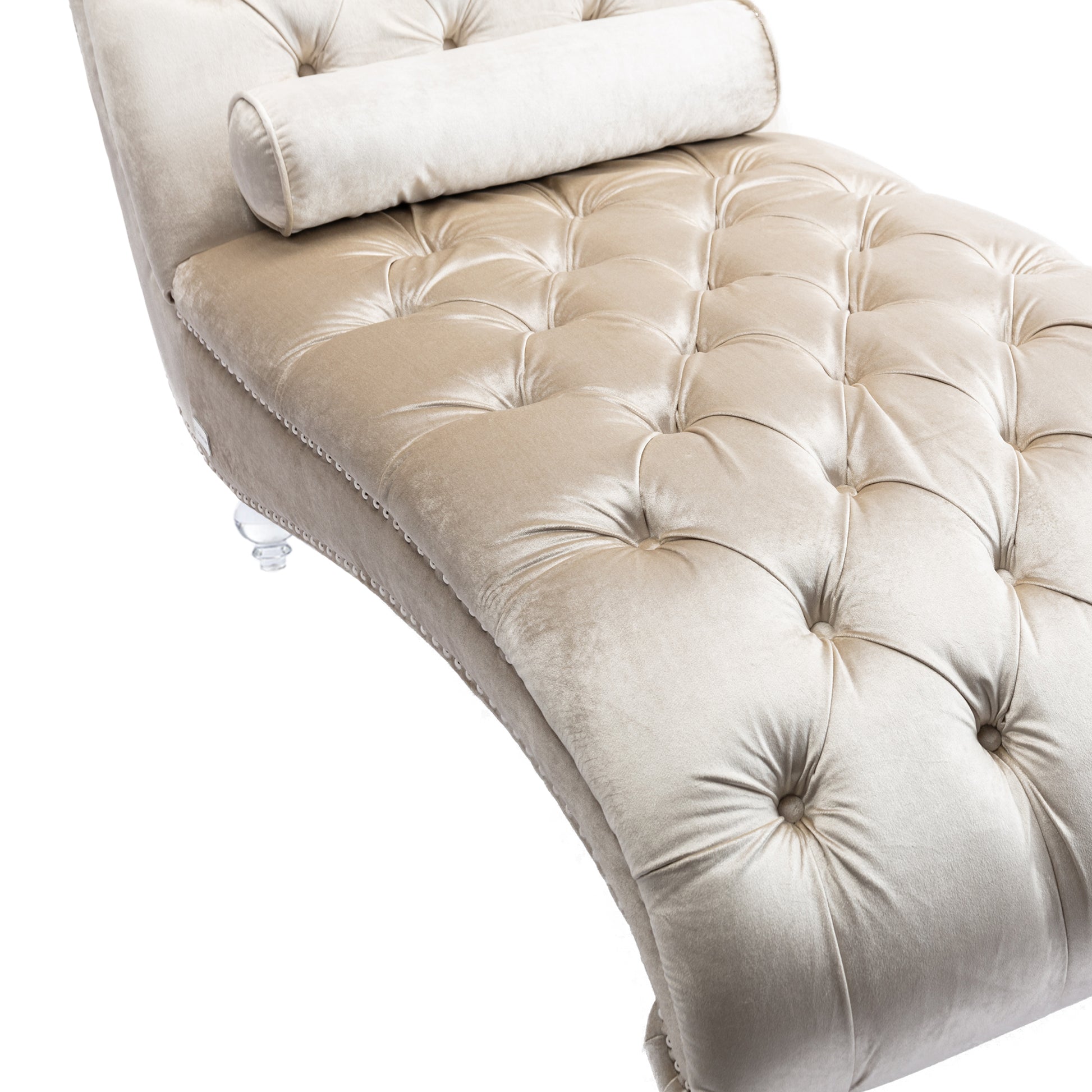 Champagne velvet tufted chaise lounge with bolster pillow and crystal legs