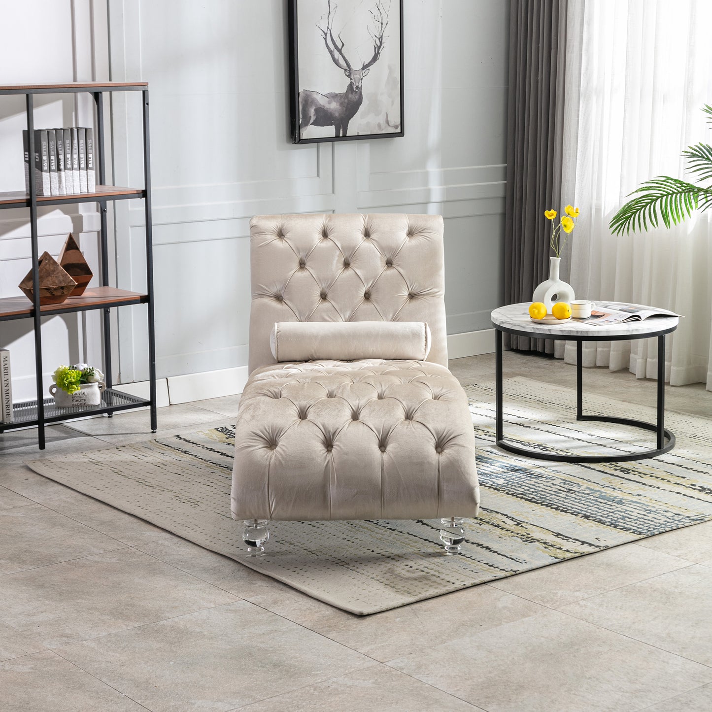 Tufted velvet chaise lounge in beige with crystal legs perfect for modern living spaces
