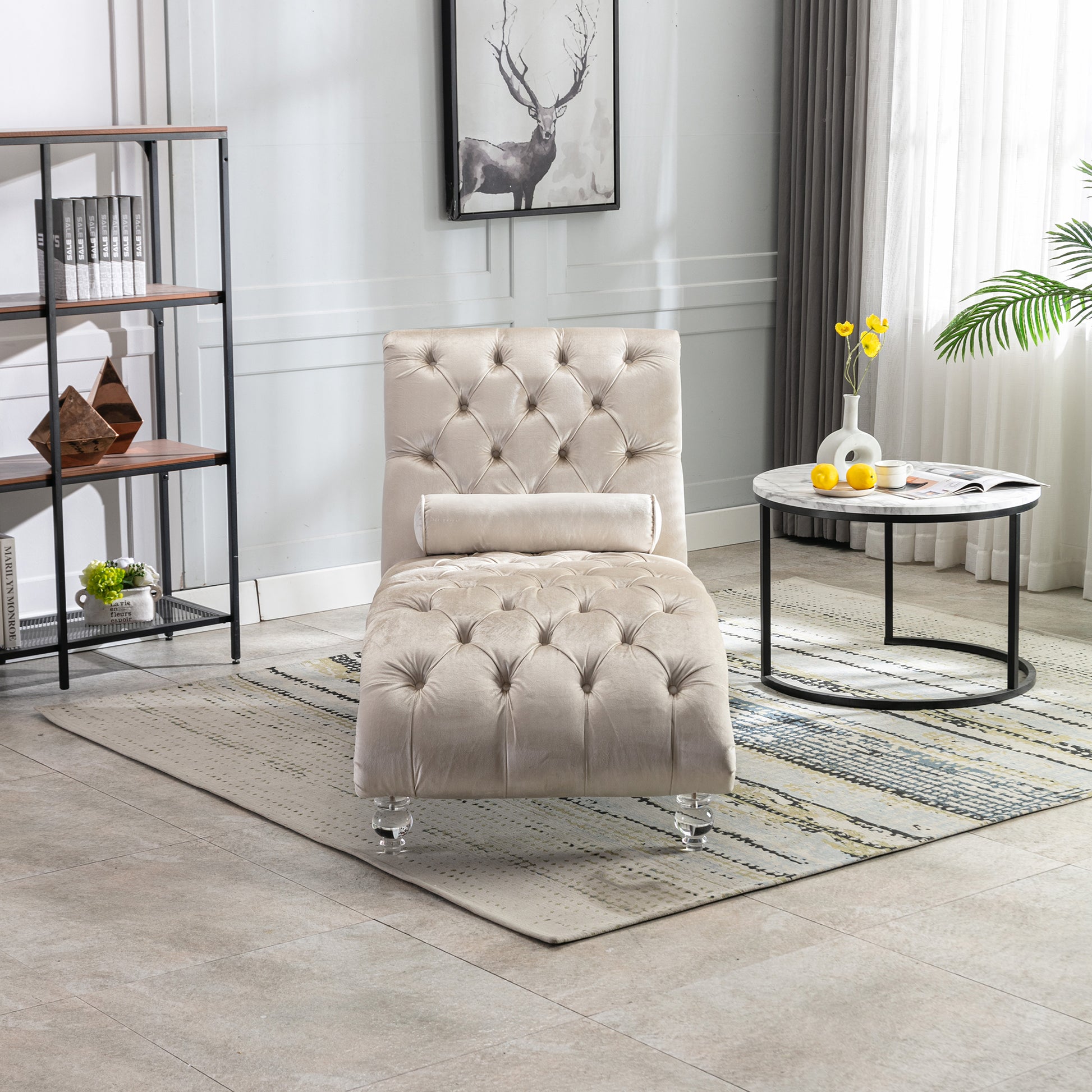 Tufted velvet chaise lounge in beige with crystal legs perfect for modern living spaces