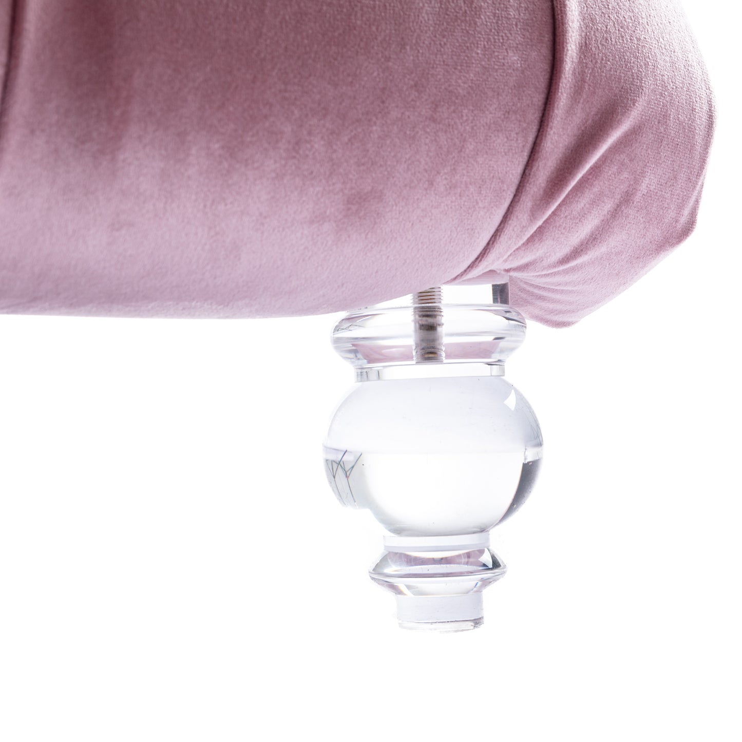 Elegant blush velvet sofa with ornate clear acrylic leg