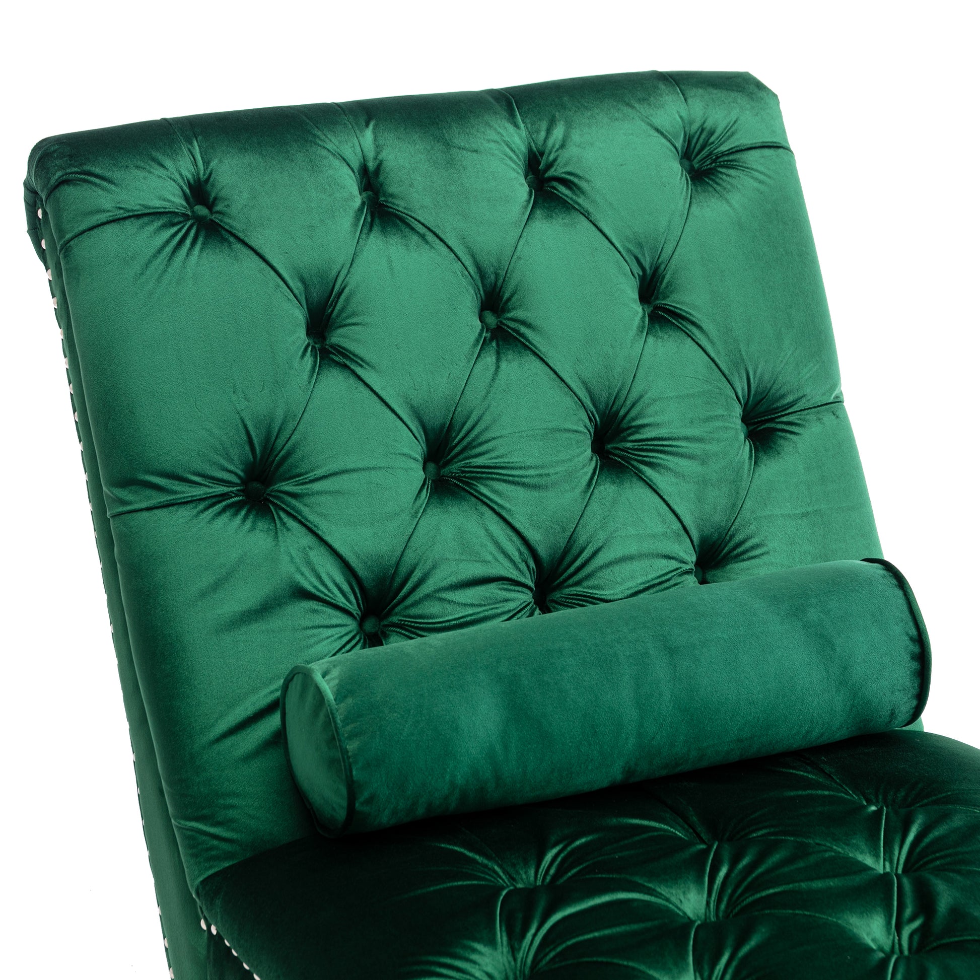 Deep emerald green velvet chaise lounge with diamond tufting and a bolster pillow