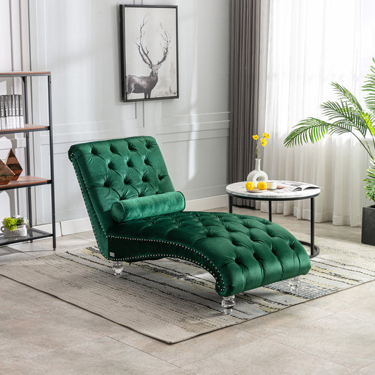 Deep green velvet tufted chaise lounge with silver nailhead trim and crystal legs