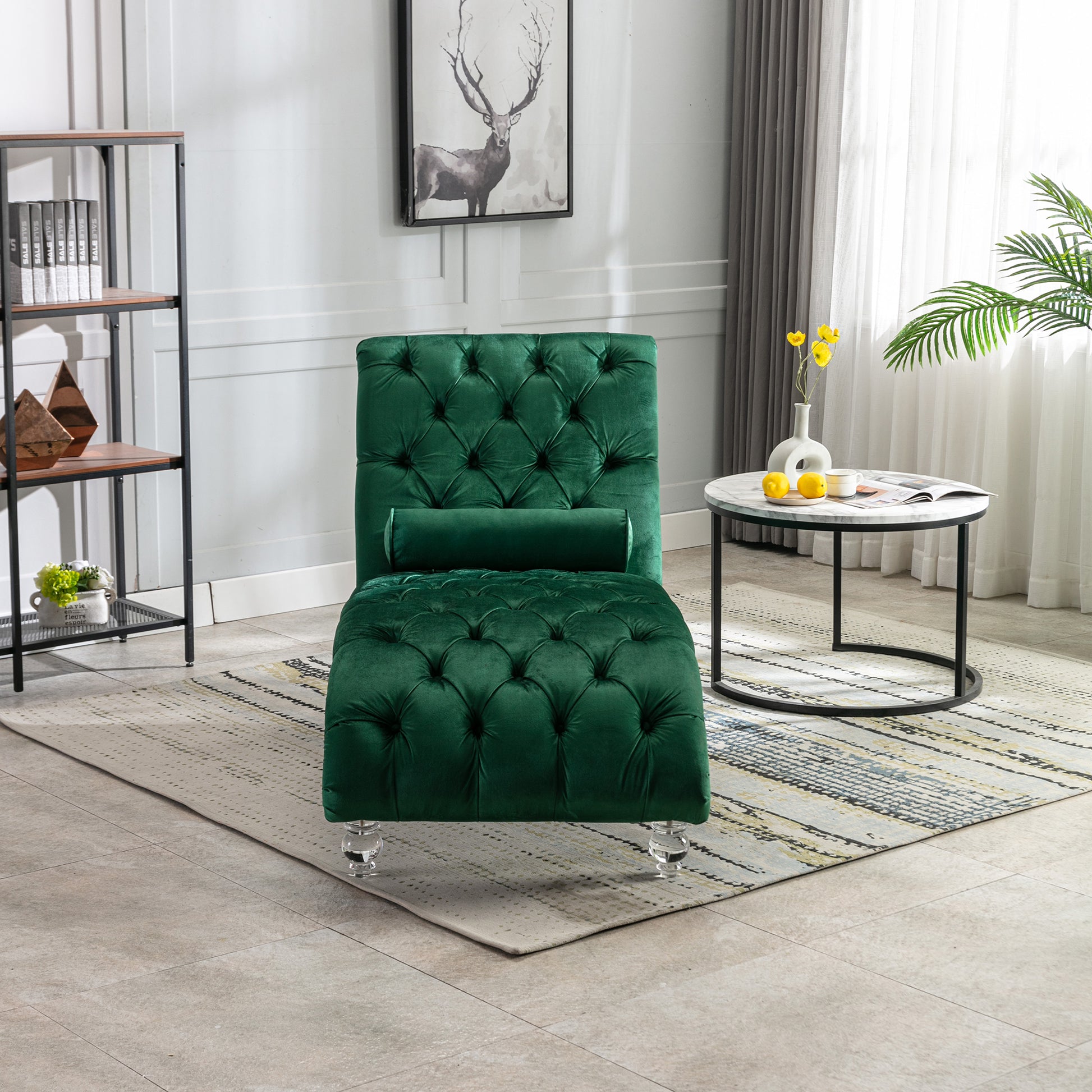 Emerald green velvet chaise lounge with diamond tufting and acrylic legs