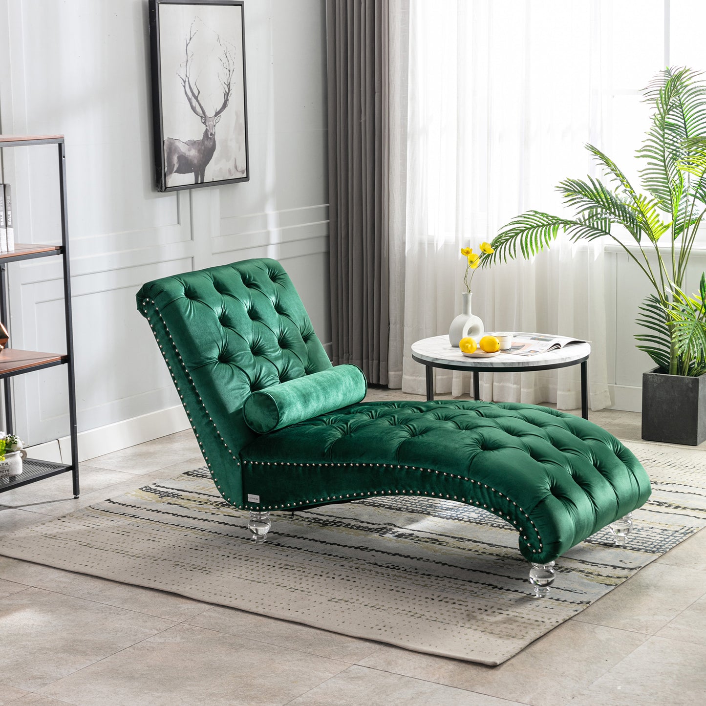 Luxurious emerald green velvet chaise lounge with crystal legs and tufted design