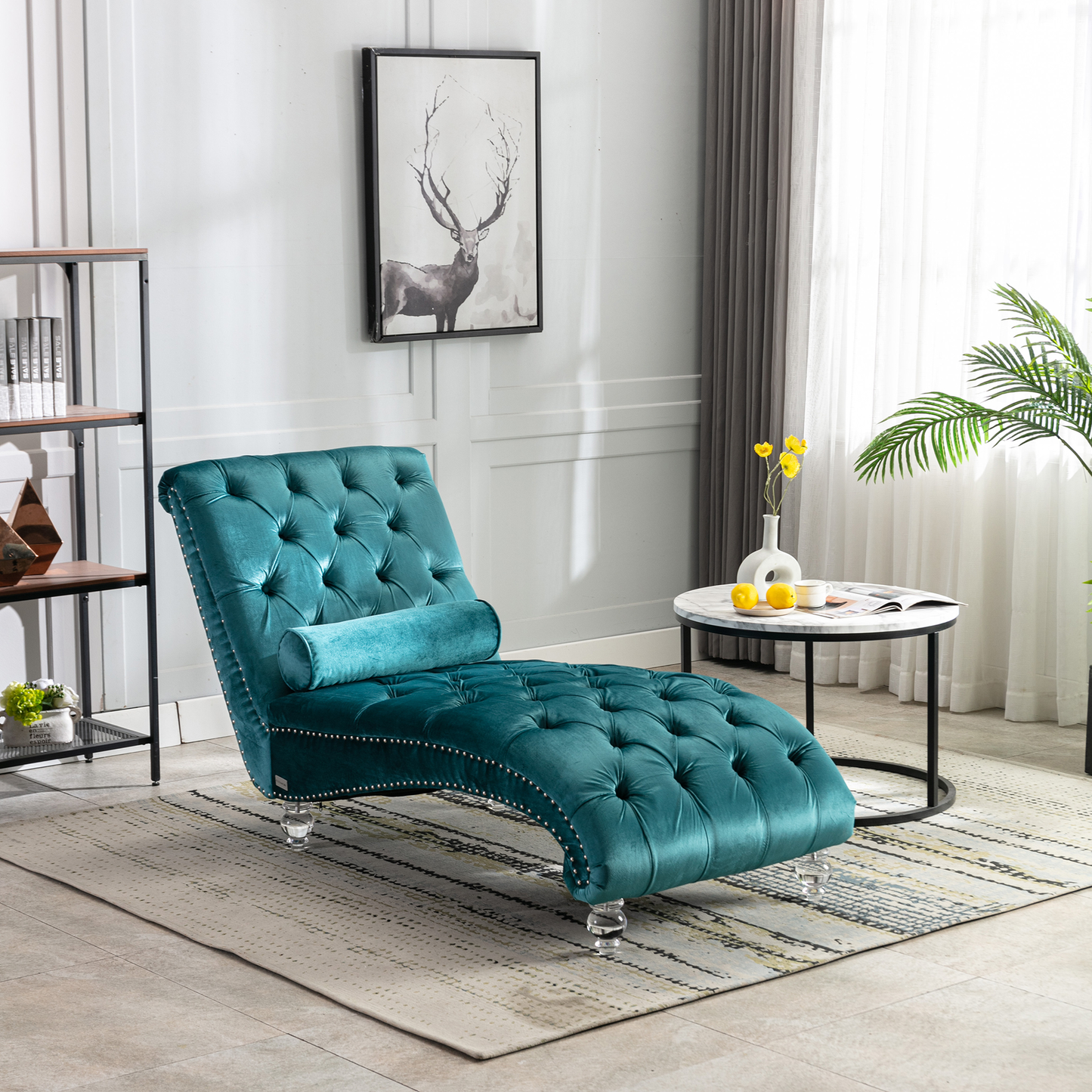 Teal velvet tufted chaise lounge with silver nailhead trim and crystal legs