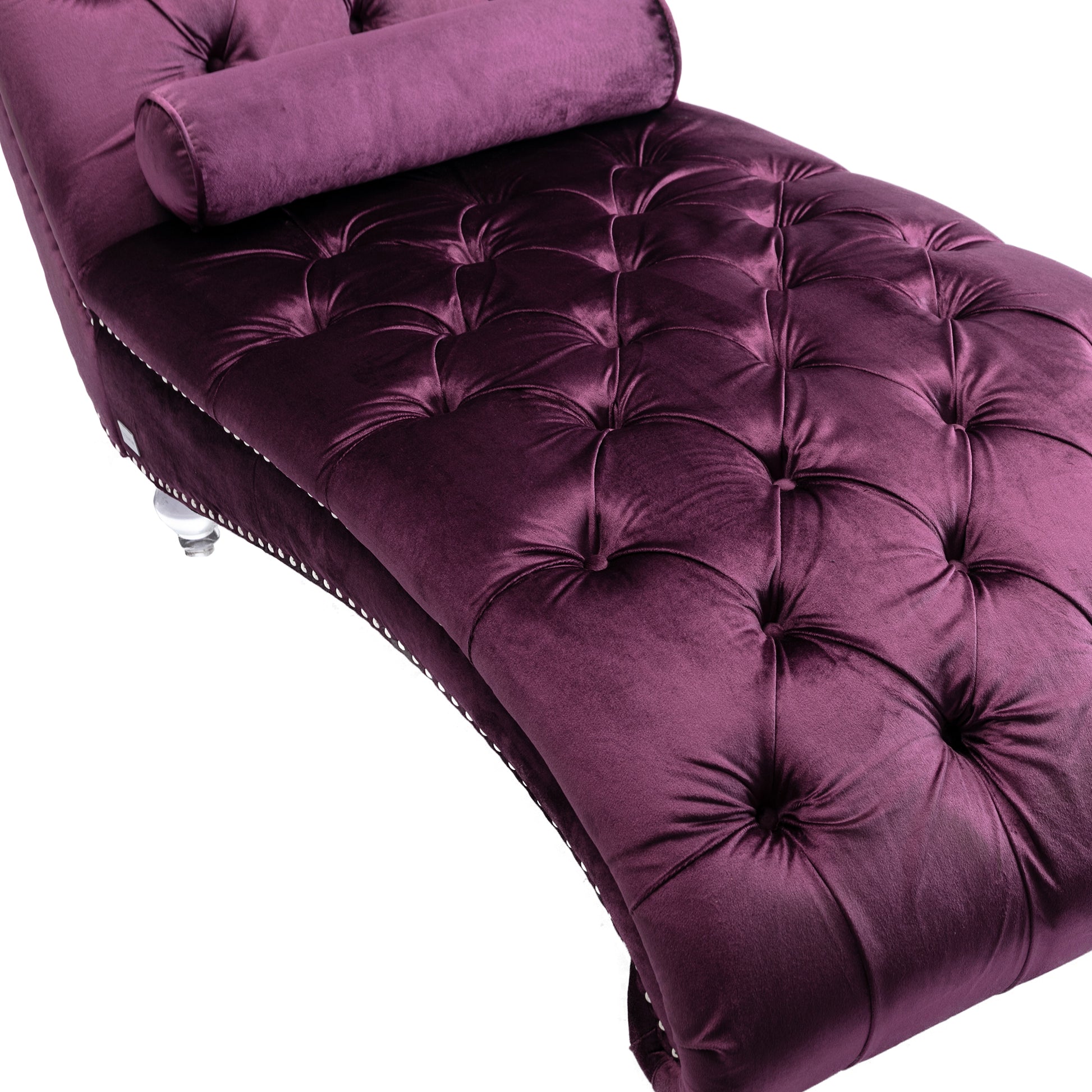 Plush purple velvet chaise lounge with deep tufting and included bolster pillow