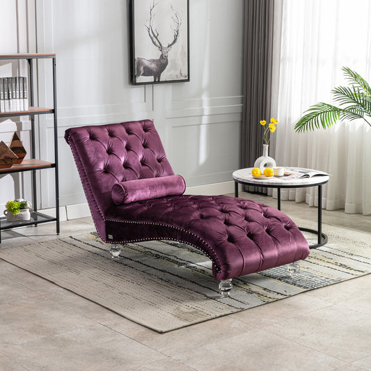 Plush purple velvet chaise lounge with crystal legs and button tufting