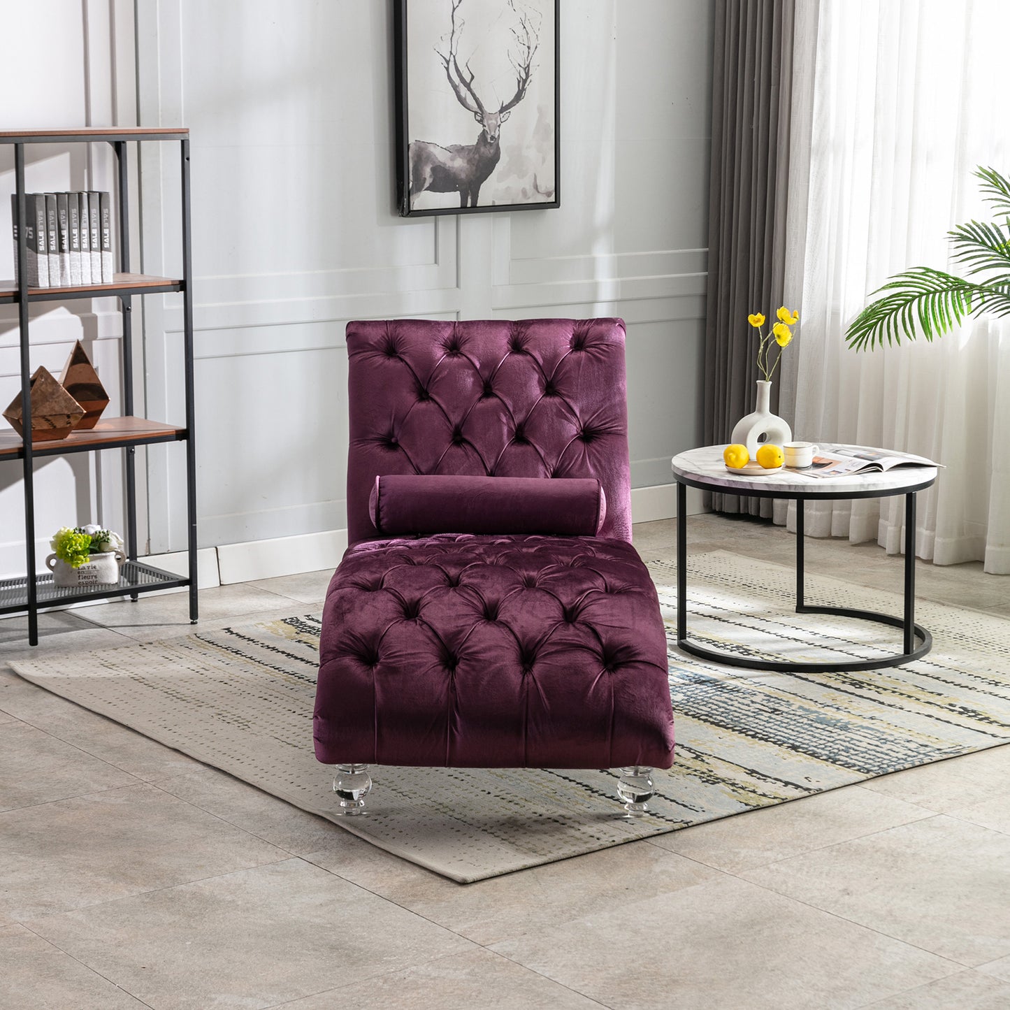 Deep purple velvet chaise lounge with tufted design and clear acrylic legs