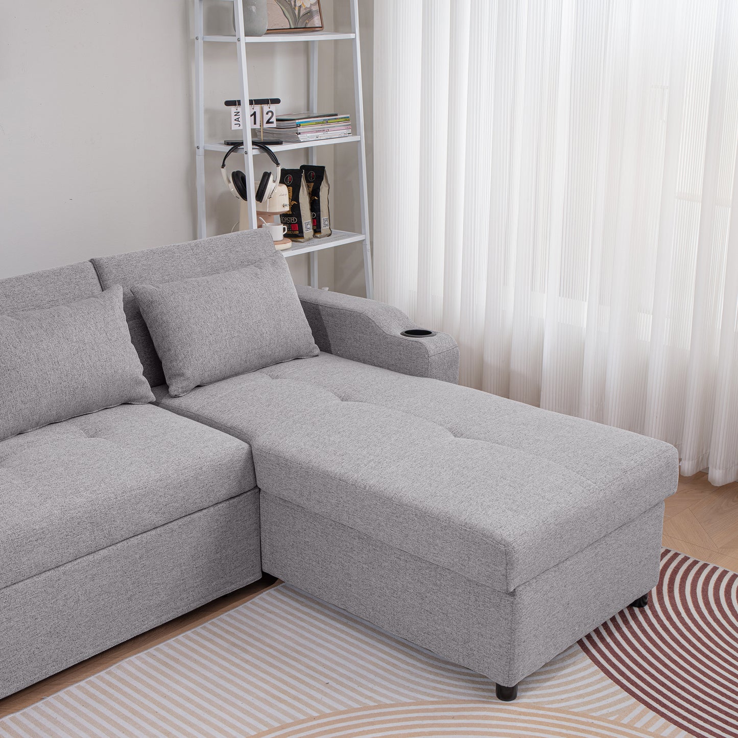 Grey fabric sectional sofa with chaise lounge and builtin cup holder