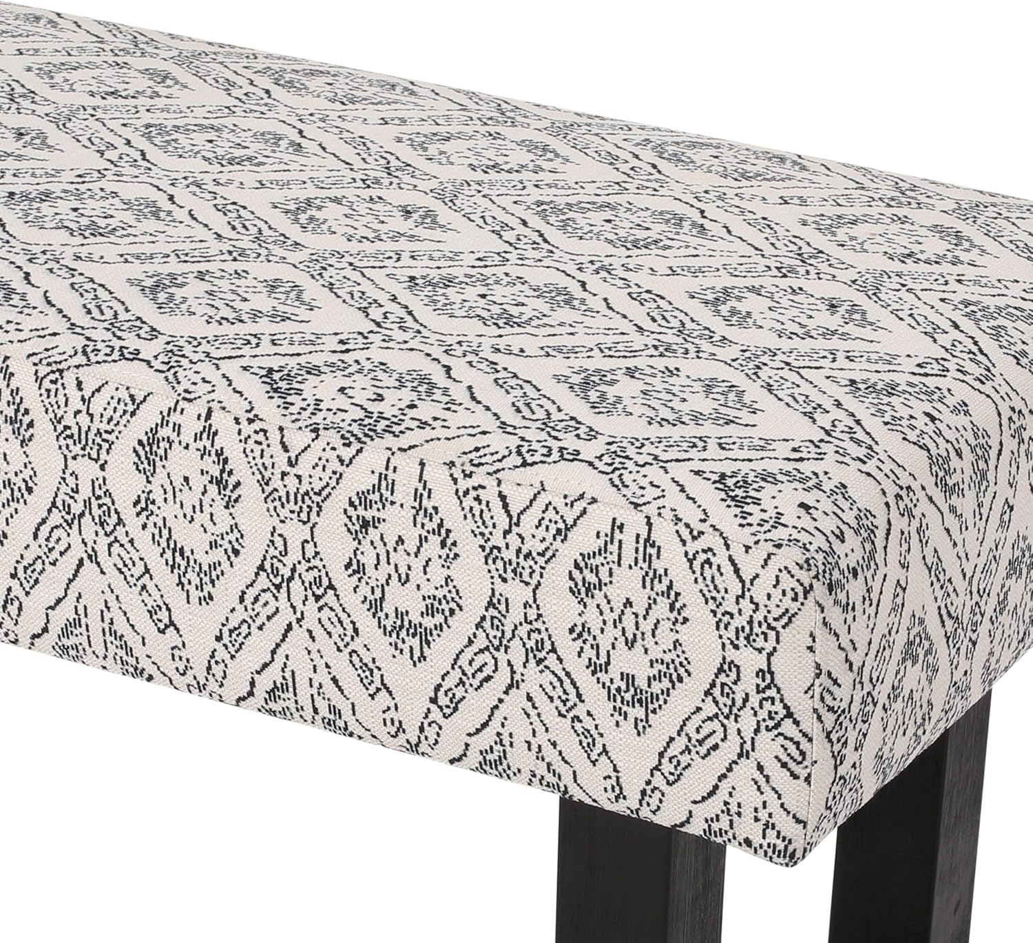 Cream and black patterned upholstered bench
