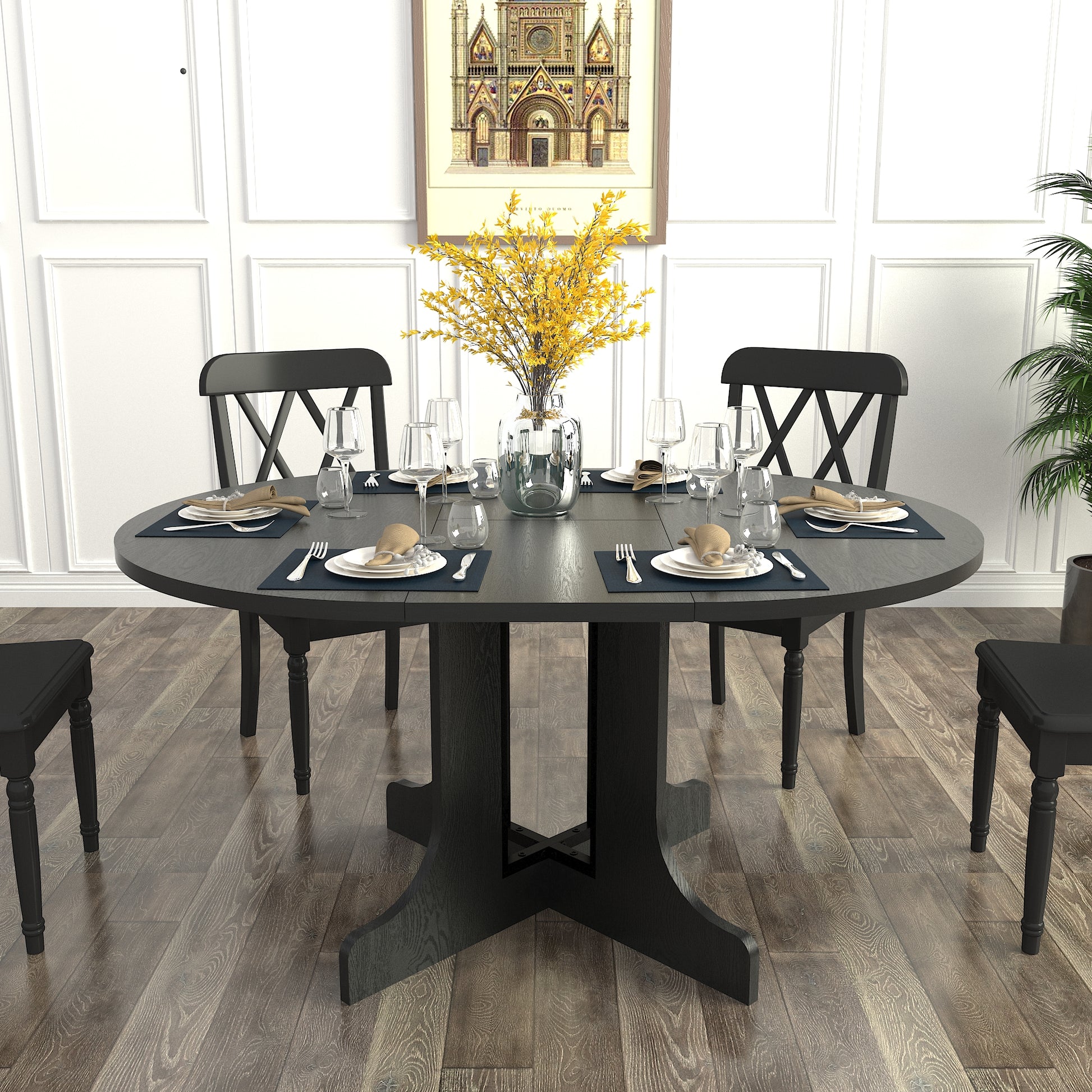 Round dining table with expandable leaf and dark wood finish seats six