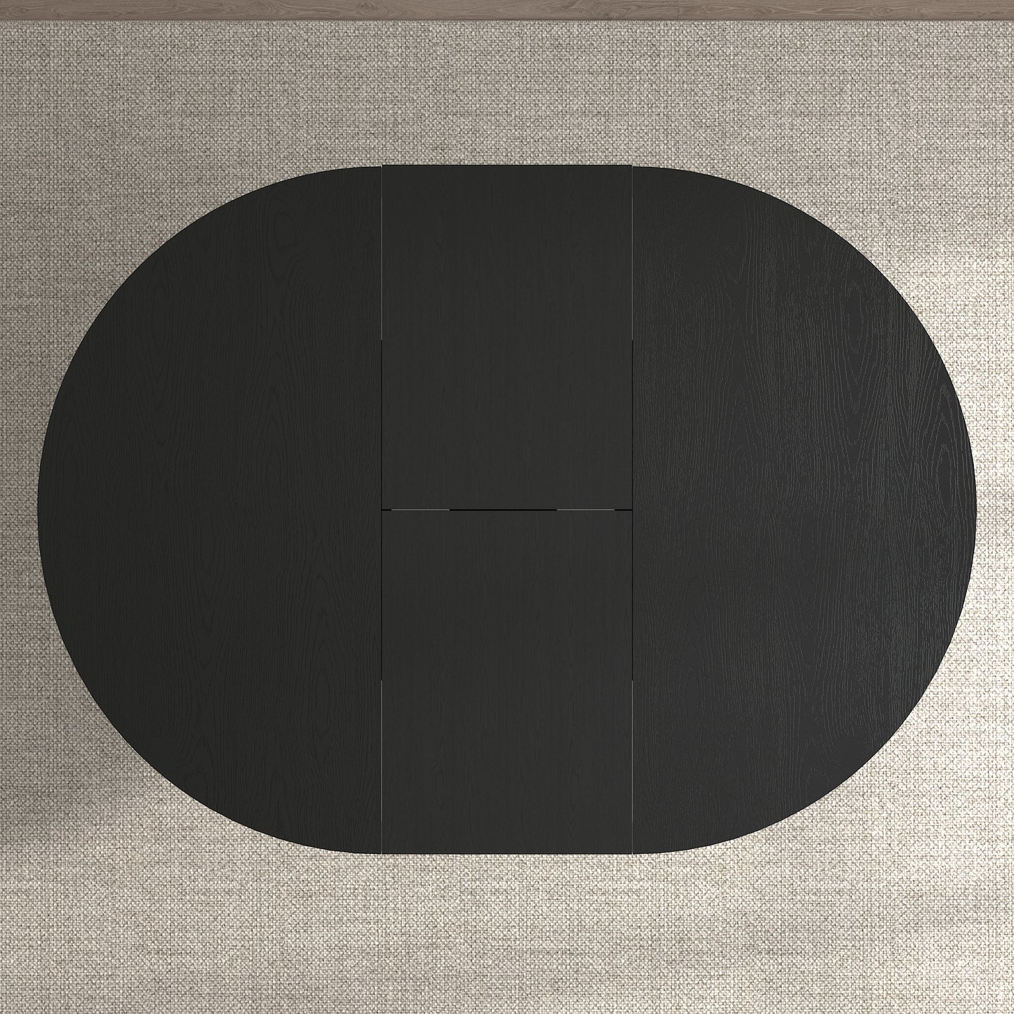 Black oval dining table with wood grain detail and drop leaves