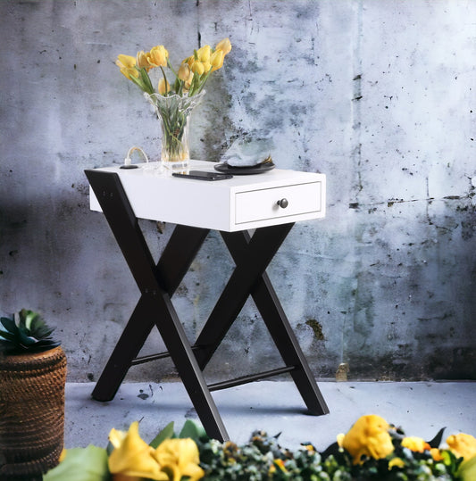 Modern white side table with black Xframe legs and single drawer