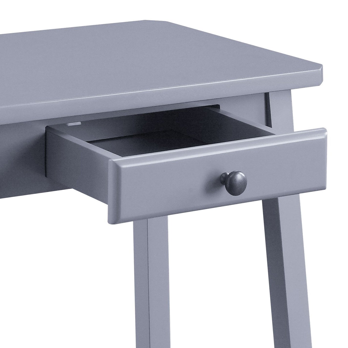 Gray minimalist desk with open drawer and round knob detail
