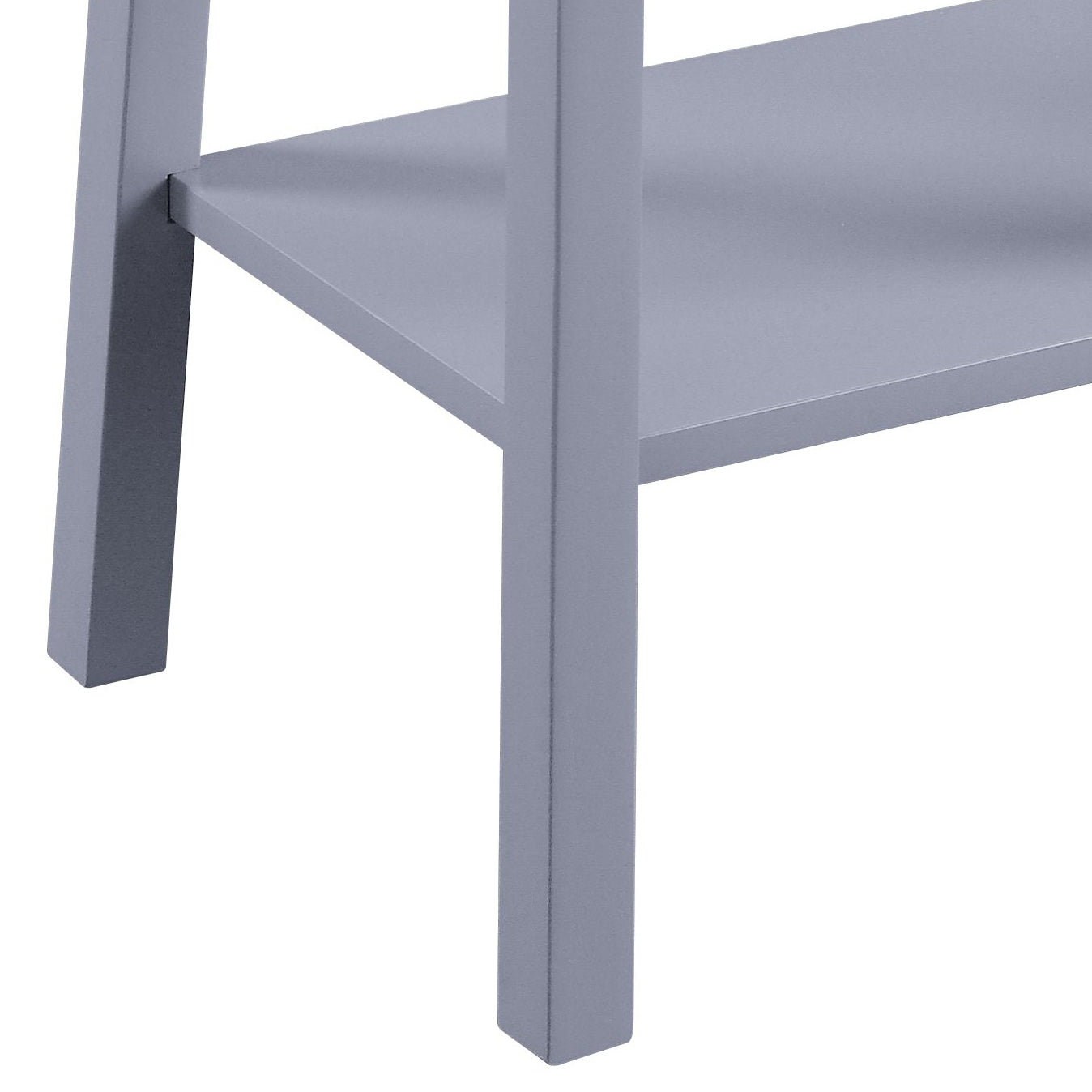 Gray metal shelf unit legs and edge against white background