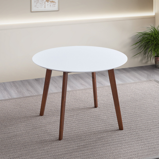 White round dining table with wooden legs perfect for small spaces