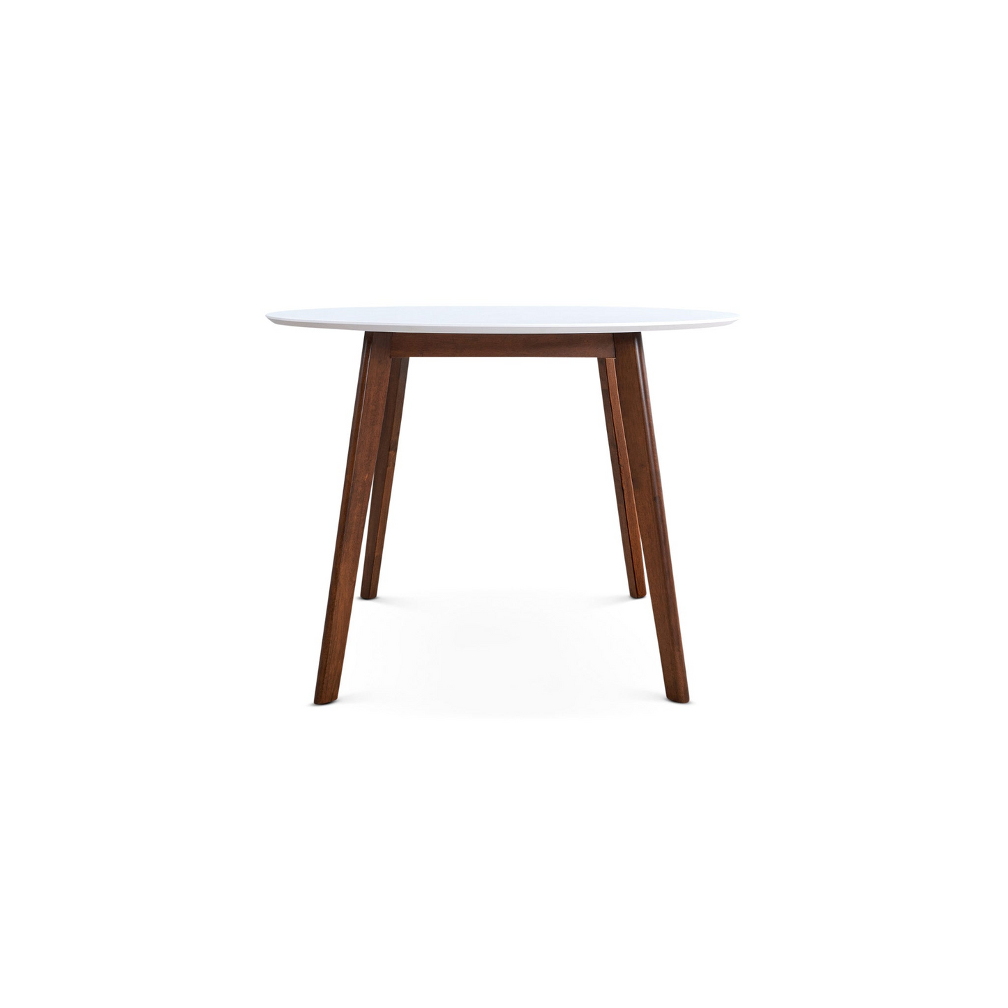 Round white dining table with tapered dark wood legs