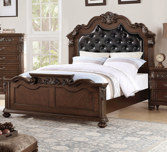 Ornate tufted dark brown leather headboard on a traditional mahogany wood bed frame