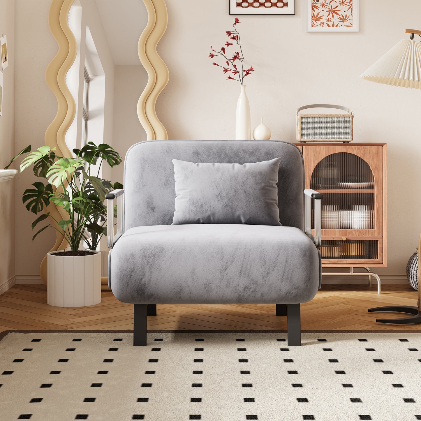 Plush grey armchair with a matching pillow perfect for a modern living room setup