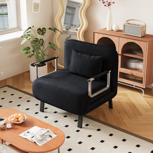 Sleek black velvet armchair with chrome accents perfect for modern living spaces