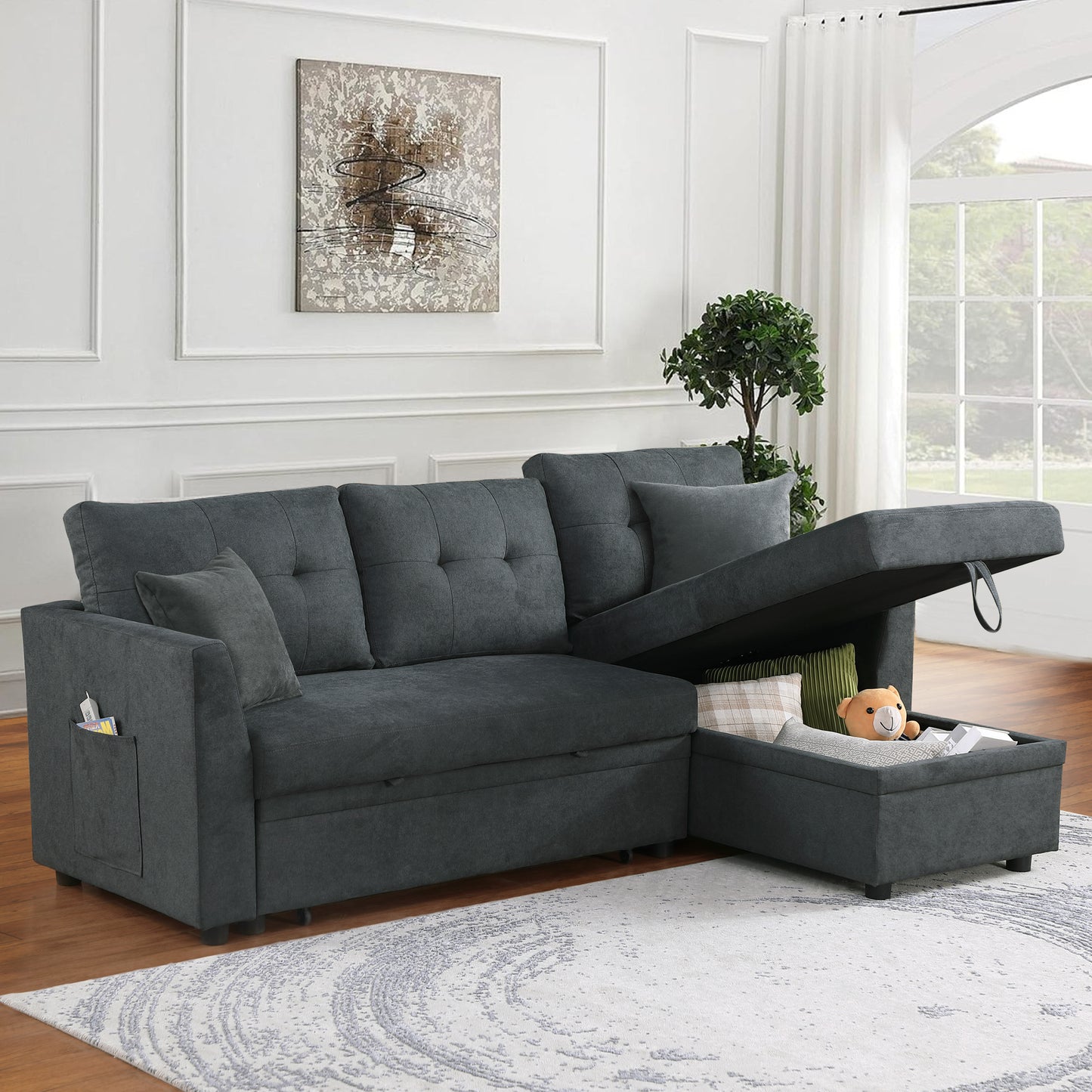 Dark gray sectional sleeper sofa with tufted cushions and hidden storage ottoman