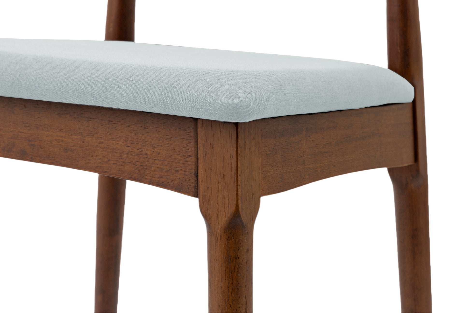 Light blue upholstered dining chair seat with rich walnut wood frame