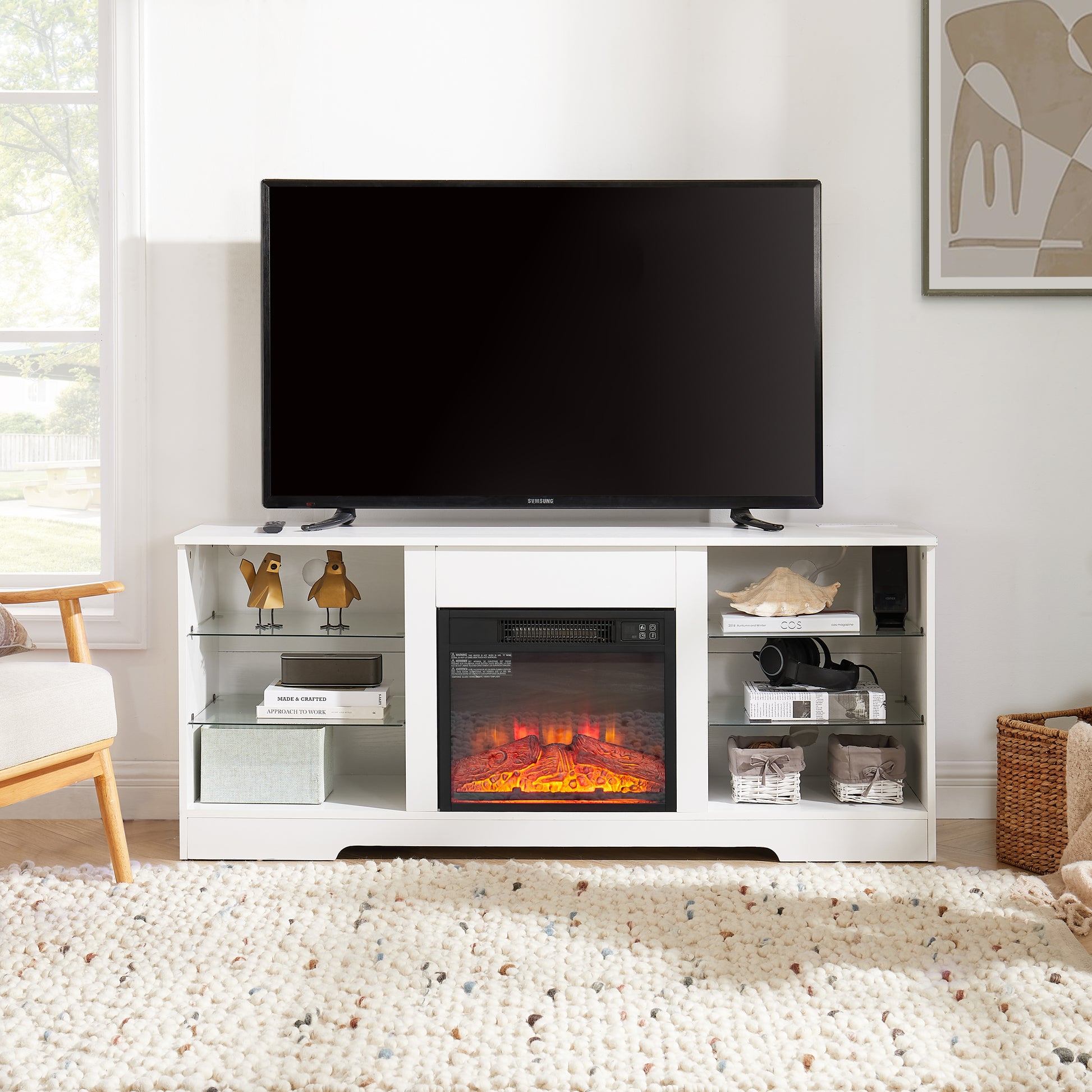 White media console with builtin electric fireplace and television