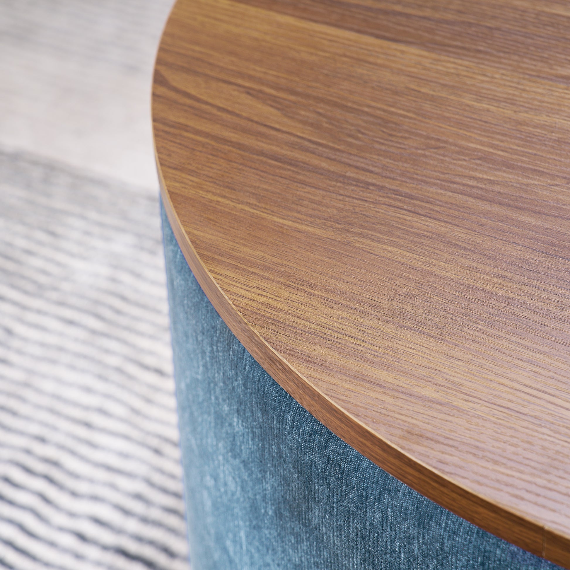 Round wood top stool with teal fabric base perfect for modern living rooms