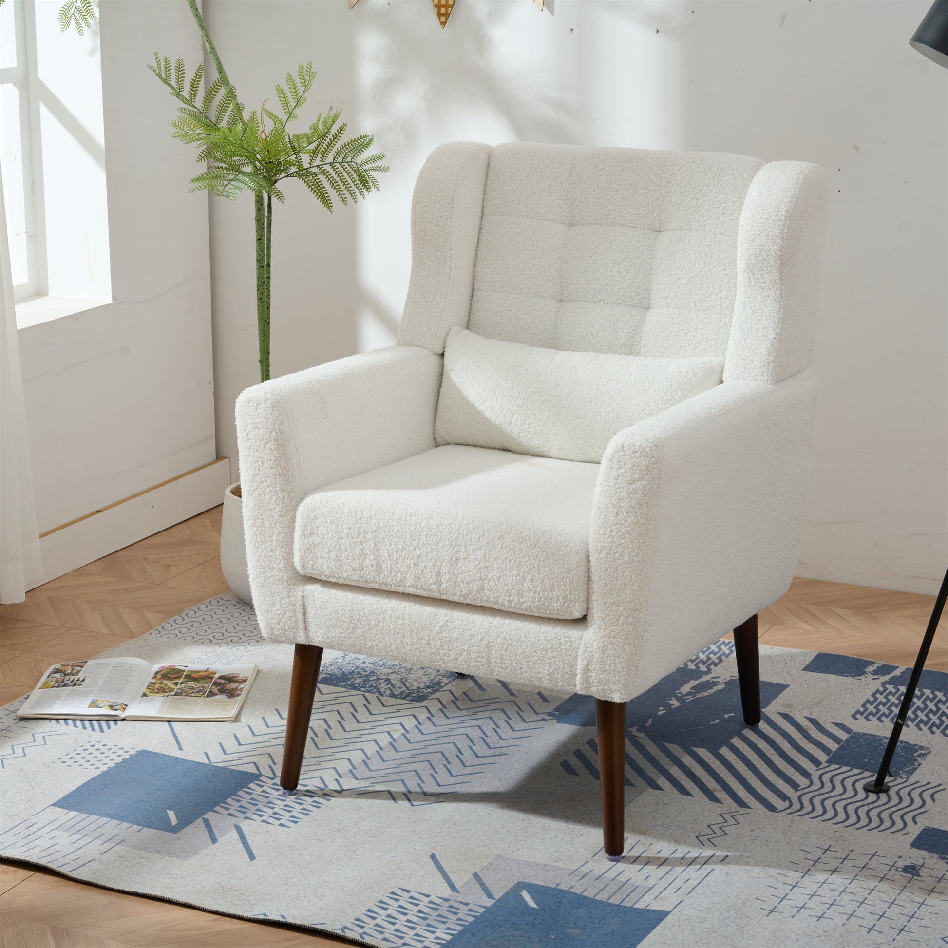 Comfortable white sherpa accent chair with button tufting and wooden legs