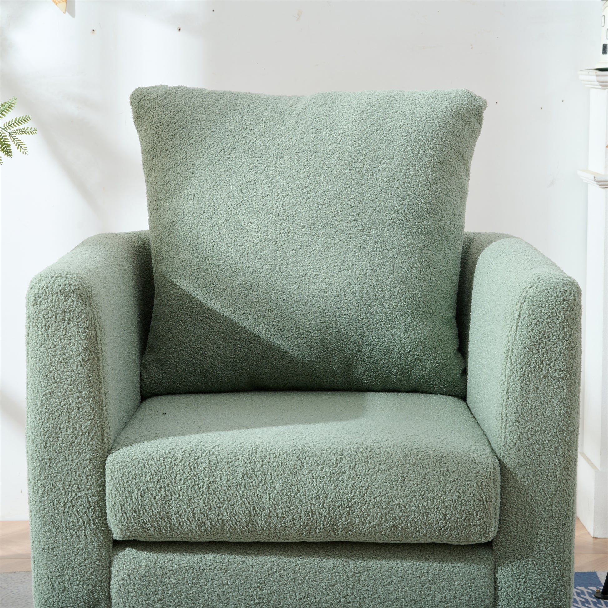 Cozy sage green teddy bear fabric armchair with matching throw pillow