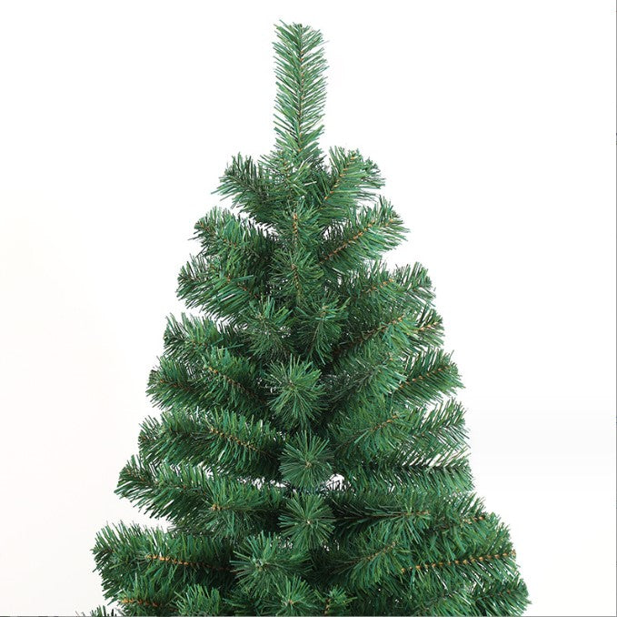 Closeup of a realistic artificial Christmas tree with lush green needles