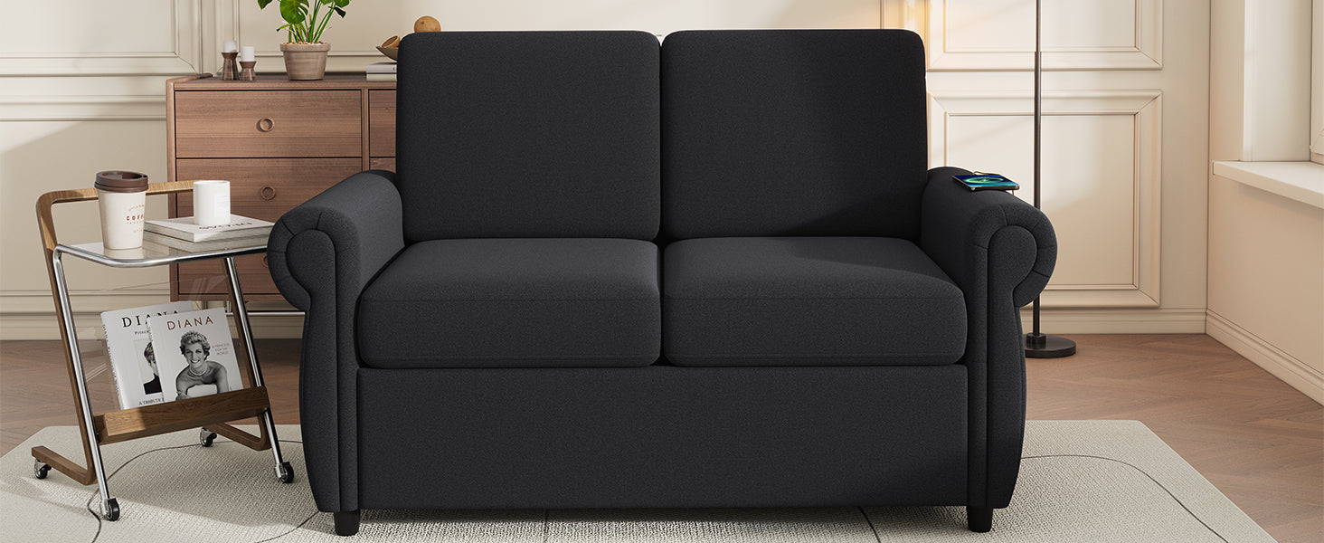 Dark grey fabric loveseat with curved arms and a builtin wireless charger